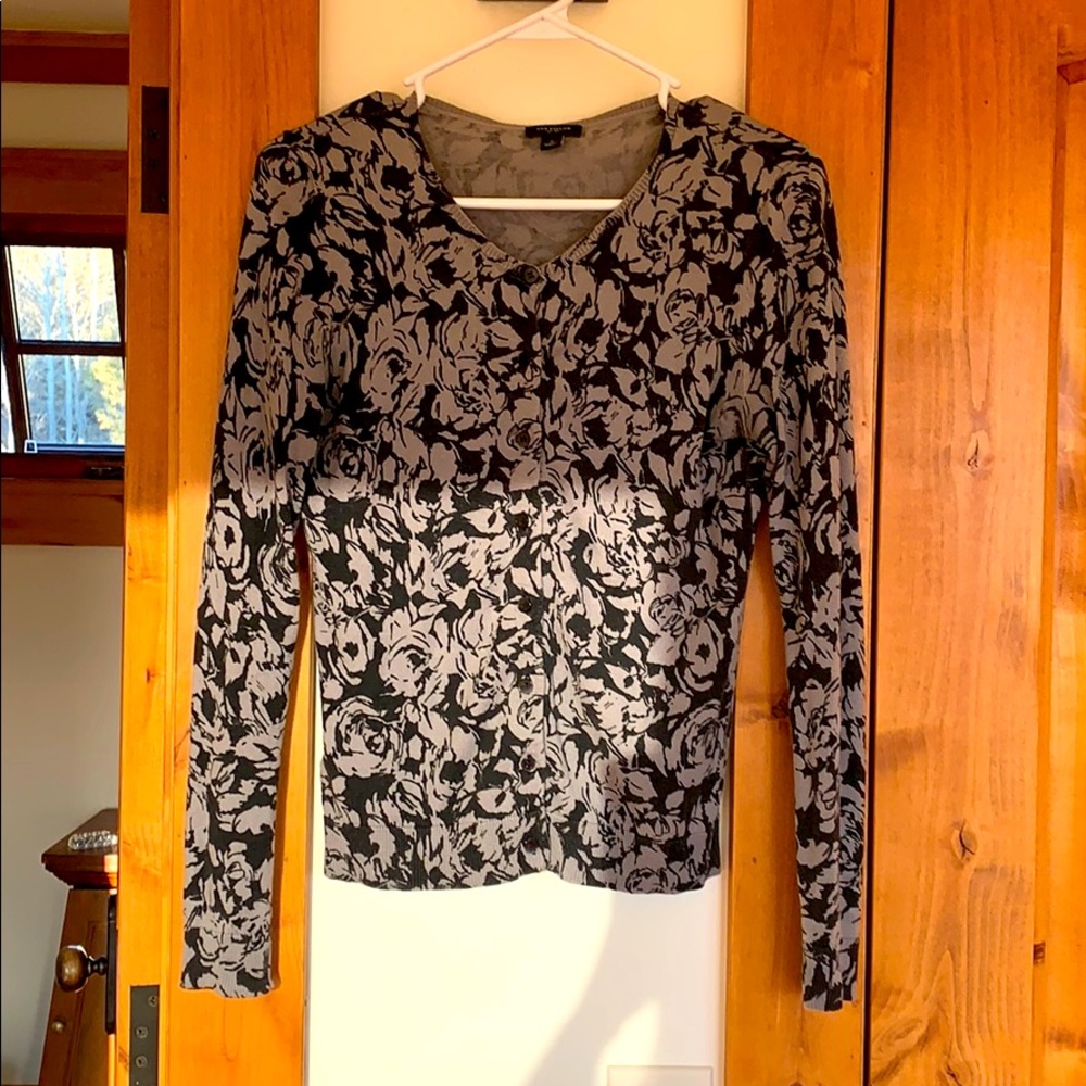 Black and grey sweater with floral pattern
